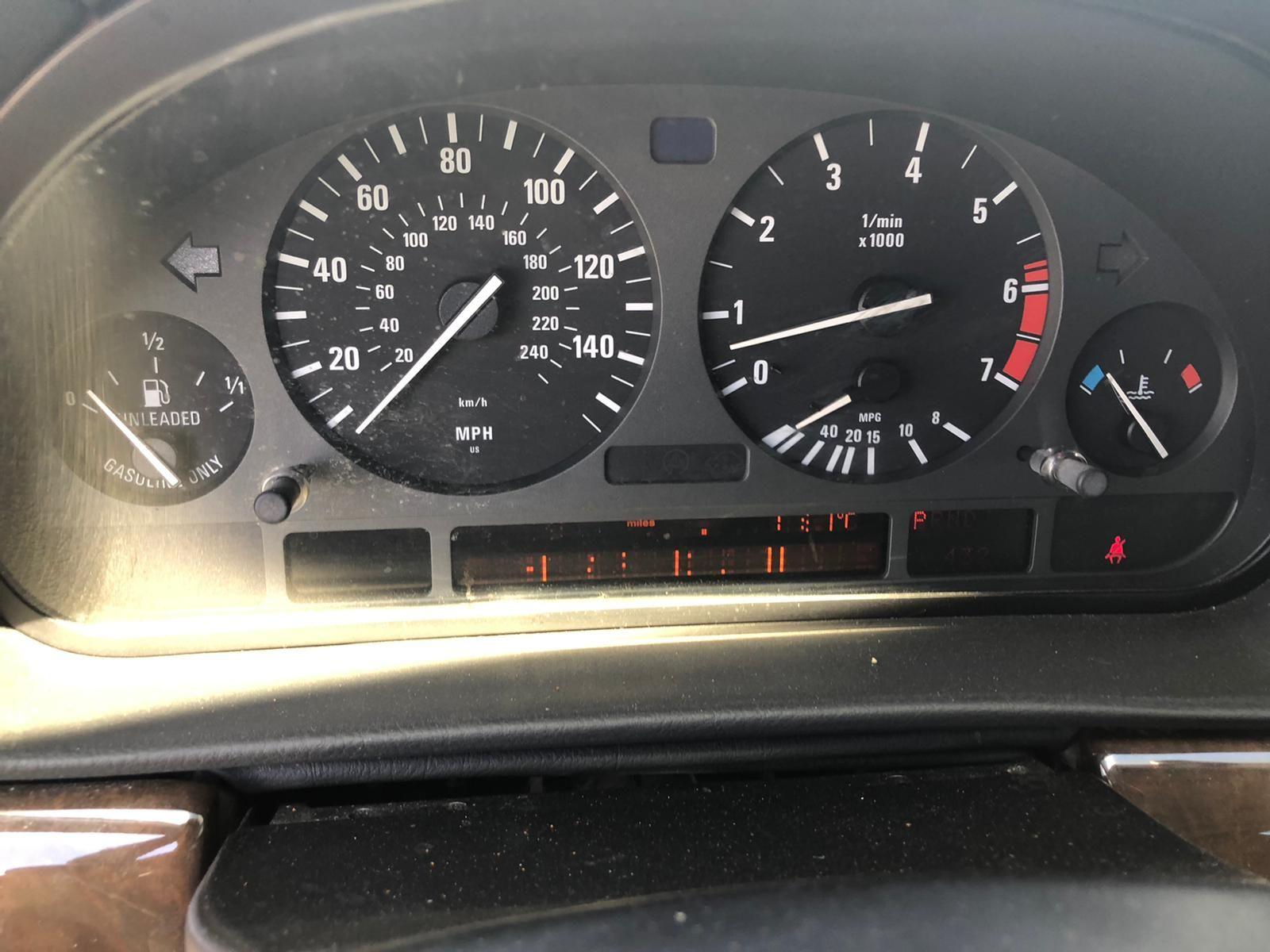 1998 BMW 740i, it has title and it runs.