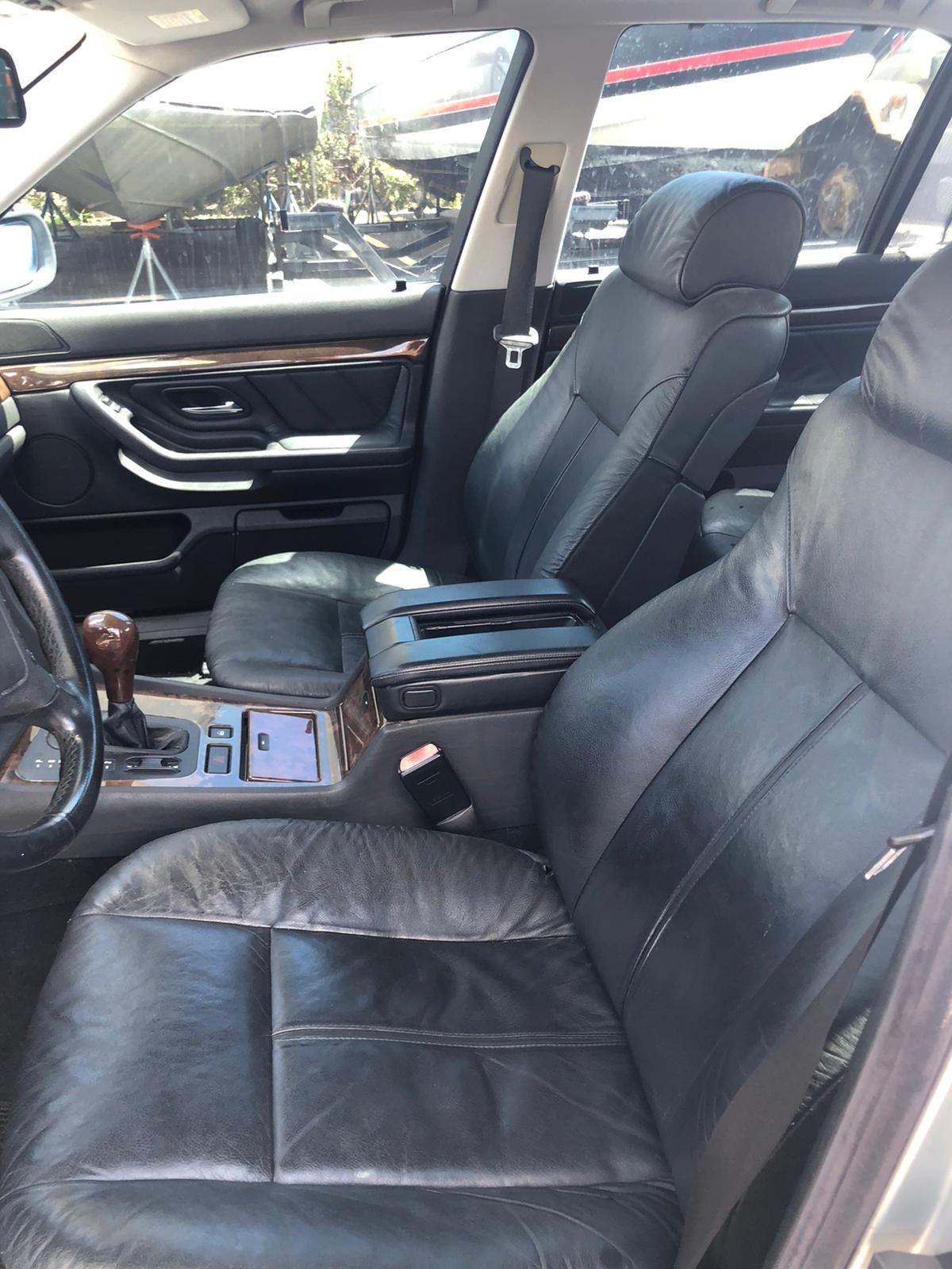 1998 BMW 740i, it has title and it runs.