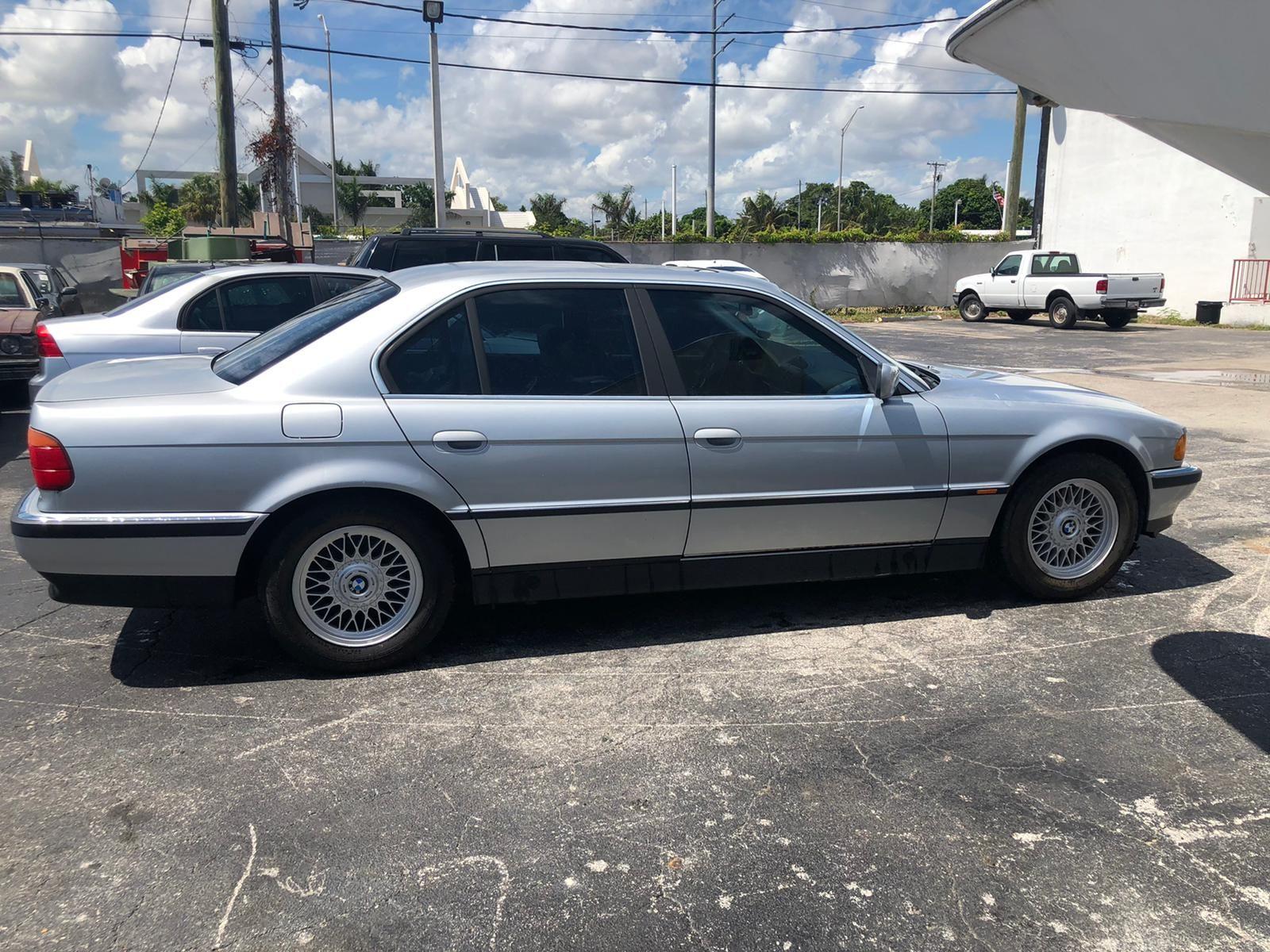 1998 BMW 740i, it has title and it runs.