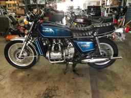 1977 Honda Goldwing GL1000, it has title and it runs.