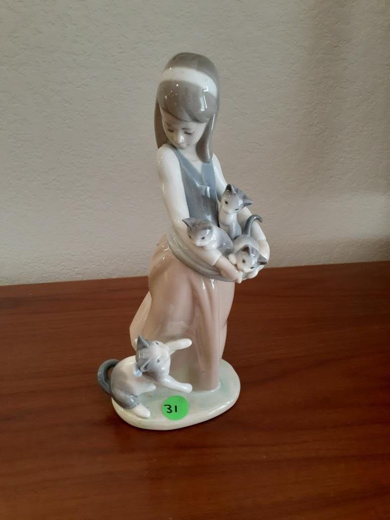 Lladro - girl holding cats -8.5 inches high