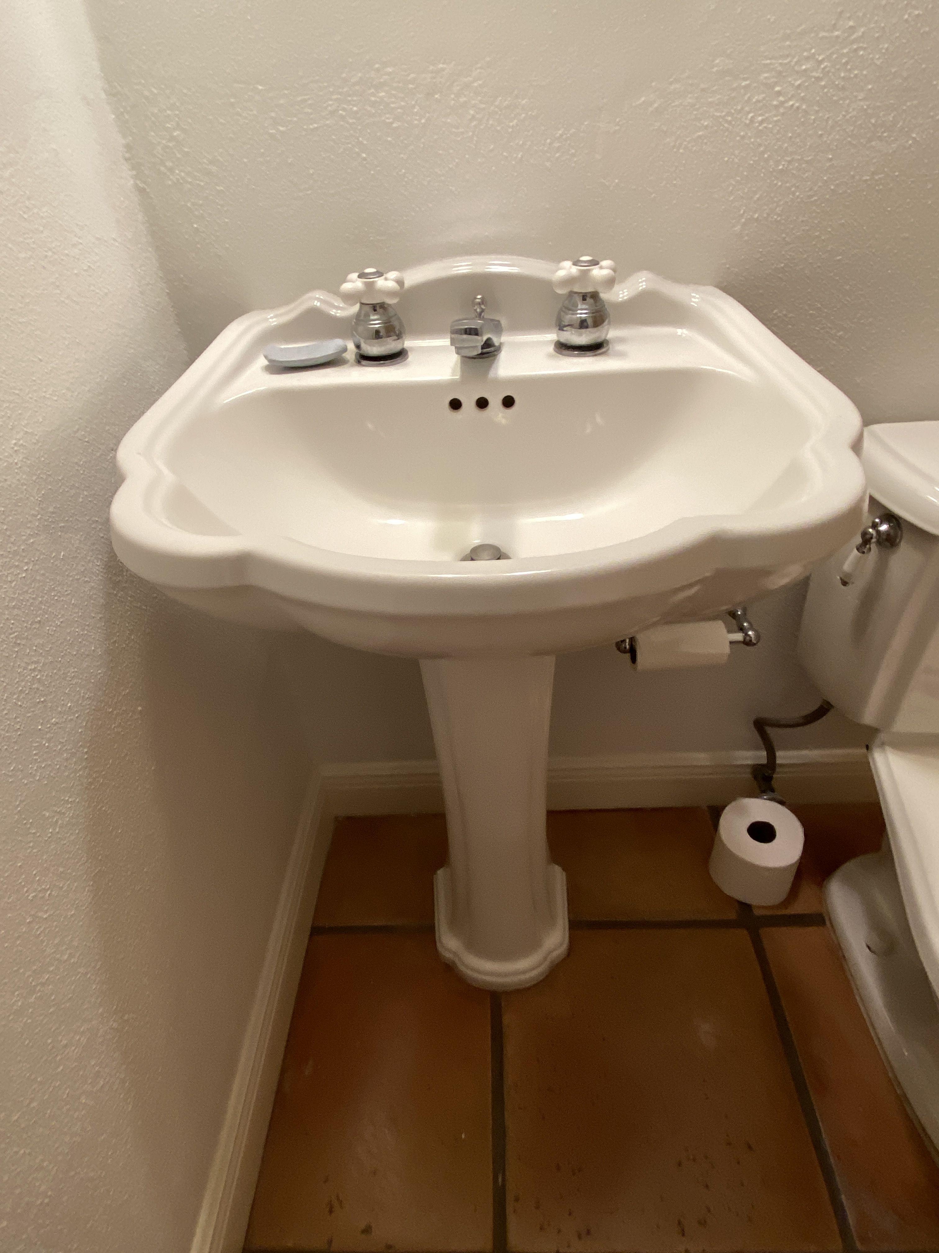 Complete Bathroom including: Pedestal Sink, American Standard Toilet, Mirror and two Bulb Vanity Lig