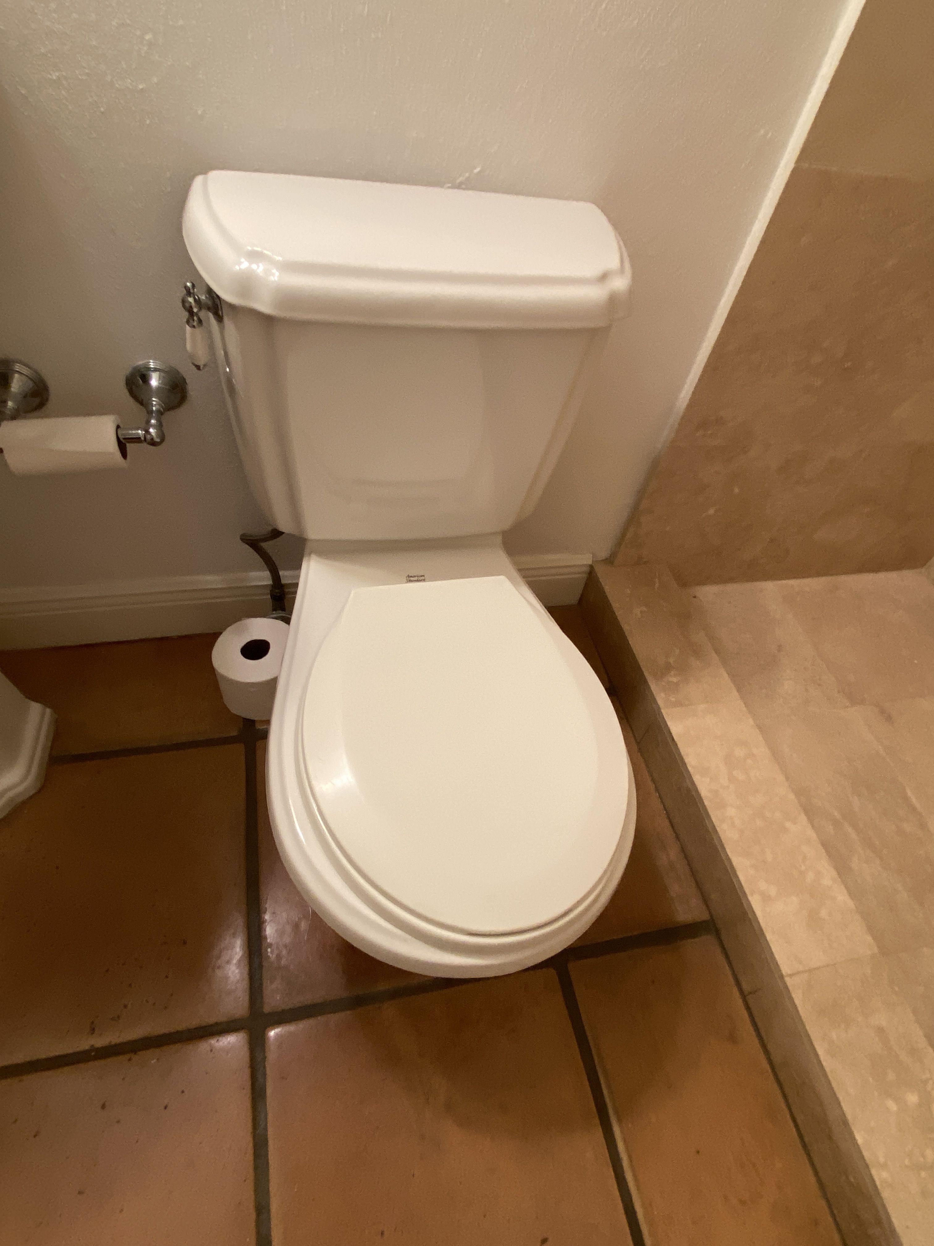 Complete Bathroom including: Pedestal Sink, American Standard Toilet, Mirror and two Bulb Vanity Lig