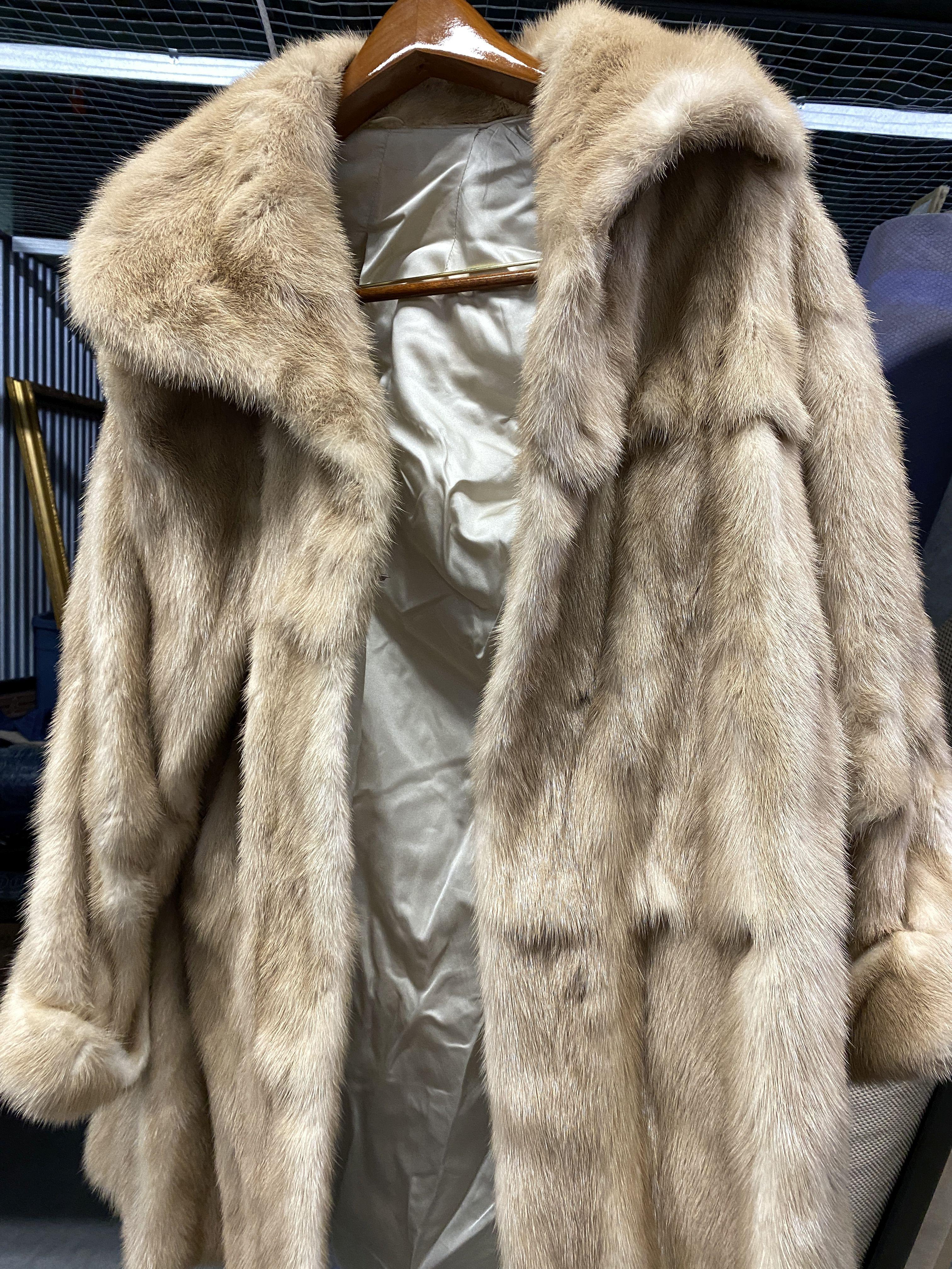 Maximillian Collection Fur Coat from Bloomingdales. The Coat is a size 10, has a Silk inner lining a