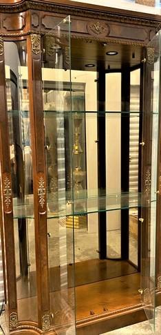 Incredible Two Glass Door Curio Cabinet with side glass viewing panels adorned with Brass Filigree D