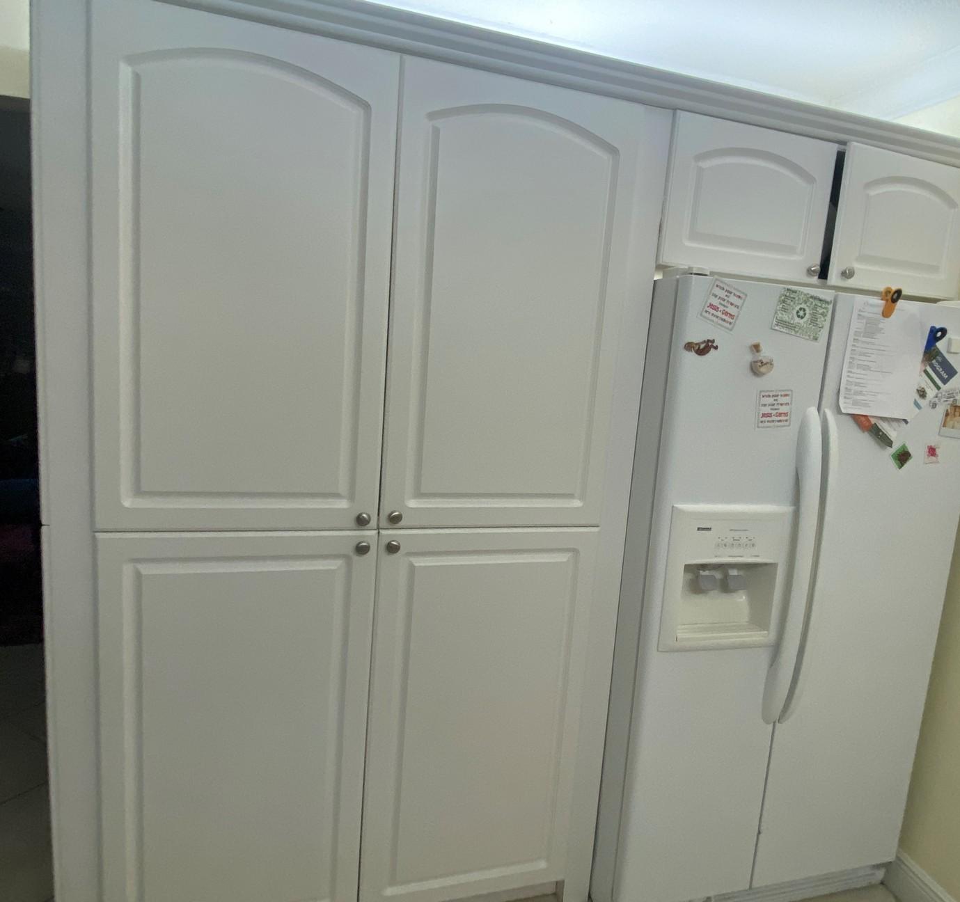 13' x 7' L-shaped White Kitchen With 12' Upper Cabinets With Crown Molding Above Granite Top - Inclu