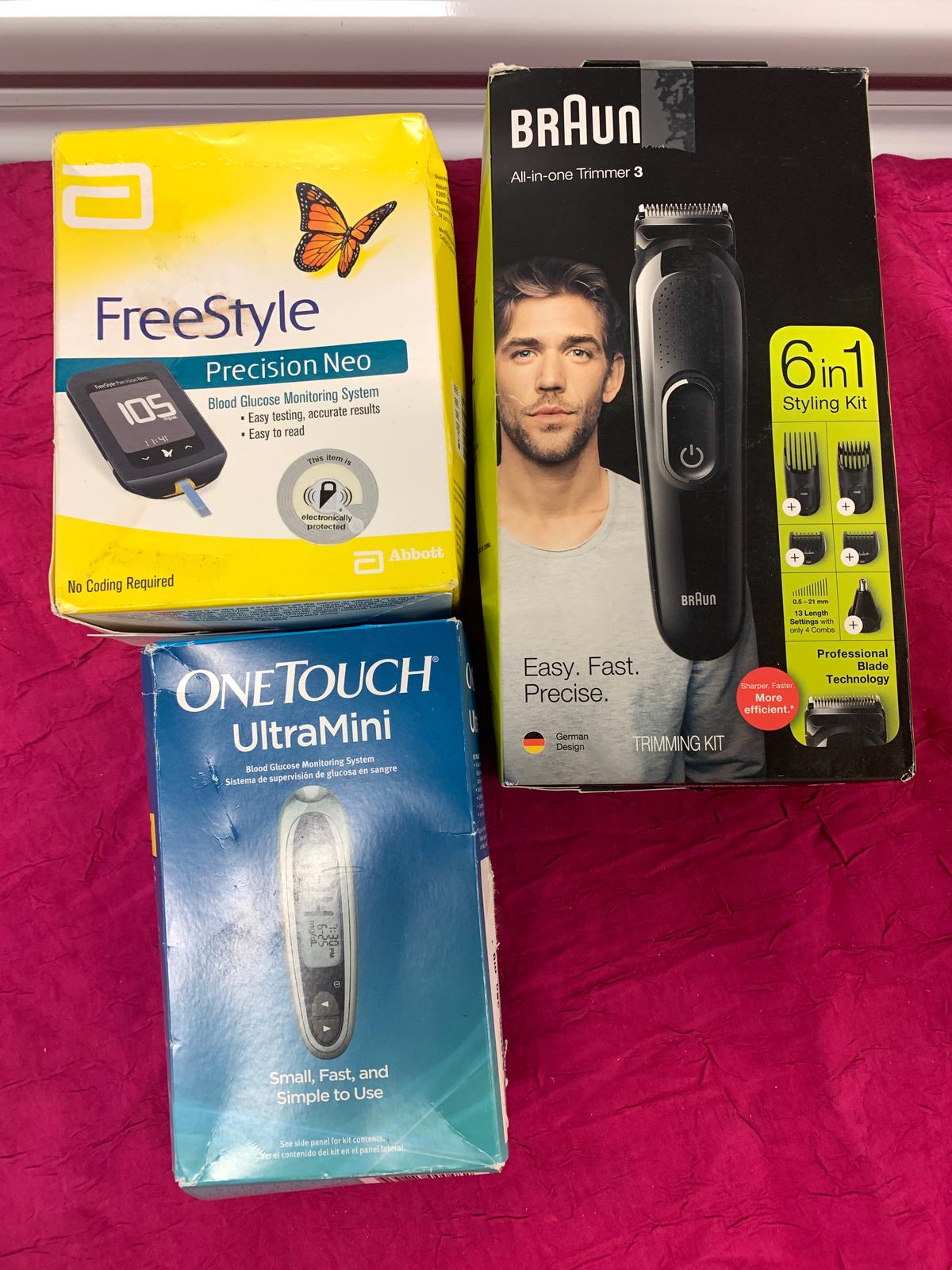 3- New Assorted Items 1- Freestyle Boold Monitor, 1- Onetouch Blood Monitor, 1- Braun All in One Tri