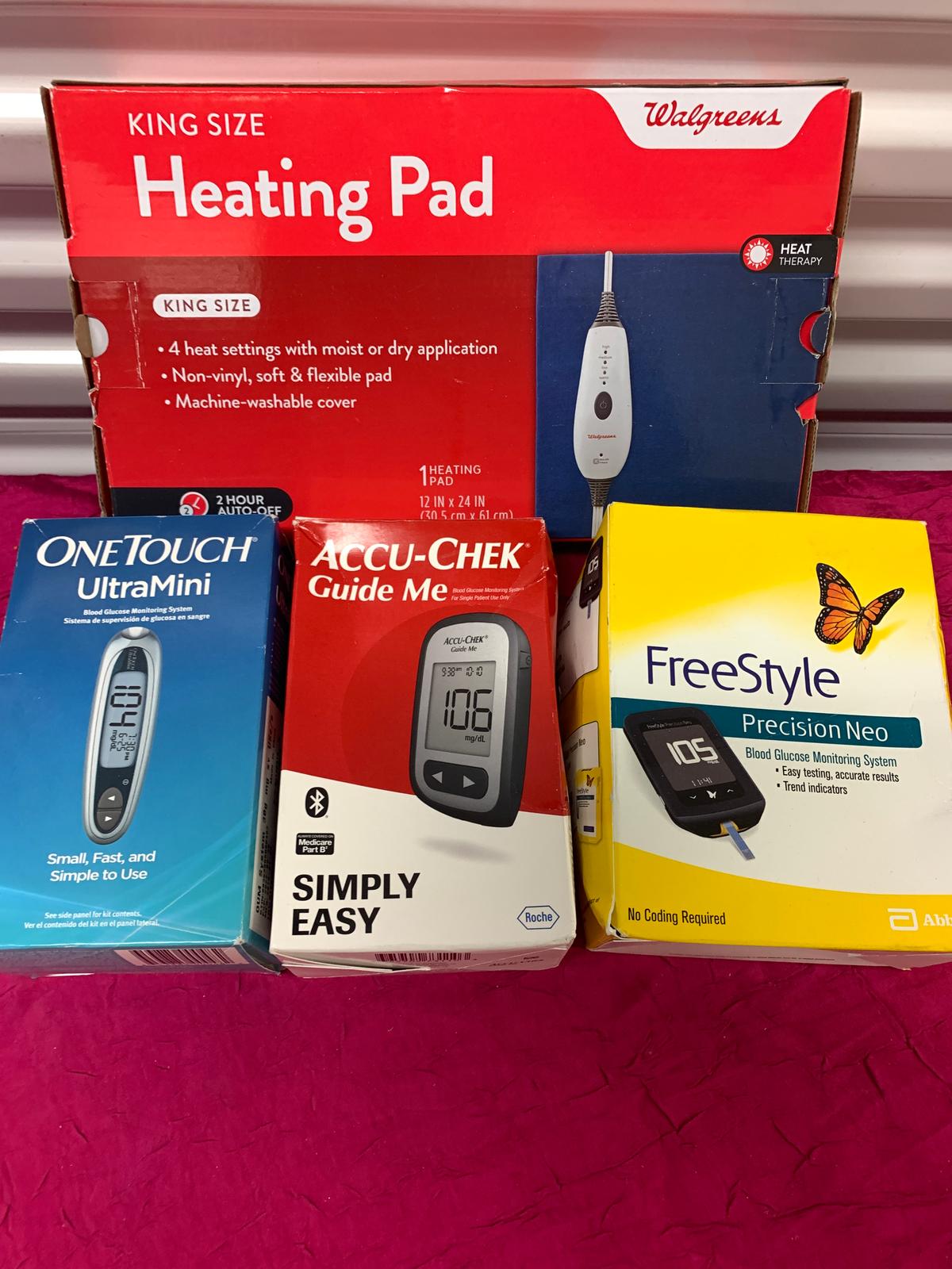 4- New Assorted Items 1- Heating Pad, 1- Freestyle Boold Monitor, 1- Onetouch Blood Monitor, 1- ACCU