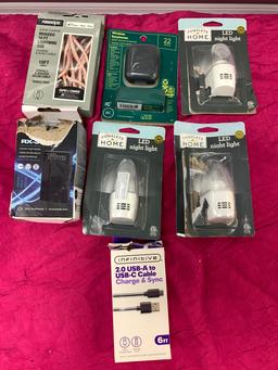 7- New Assorted Items 1- Audio Box RX-3, 3- LED Night Lights, 2- Charging Cables