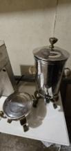 Chrome Liquid Dispenser with Bronze Handles on Stand and Extra Stand