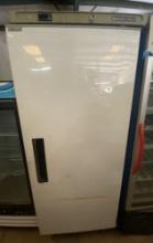 Maxx Cold single door Freezer with four epoxy coated shelves door is off missing top Hinge but works