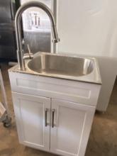 21" x 24" stainless steel sink with goose neck faucet built into two door cabinet