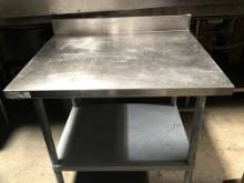 36" x 29" stainless steel Work Table  with 4" backsplash and unders shelf.