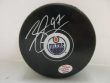 Connor McDavid of the Edmonton Oilers signed autographed hockey puck PAAS COA 550