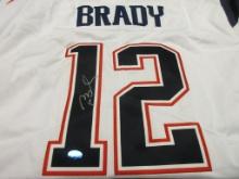 Tom Brady of the New England Patriots signed autographed football jersey TAA COA 714