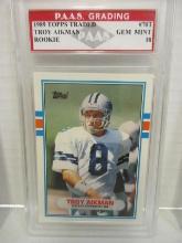 Troy Aikman Cowboys 1989 Topps Traded ROOKIE #70T graded PAAS Gem Mint 10