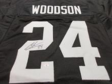 Charles Woodson of the Oakland Raiders signed autographed football jersey PAAS COA 338