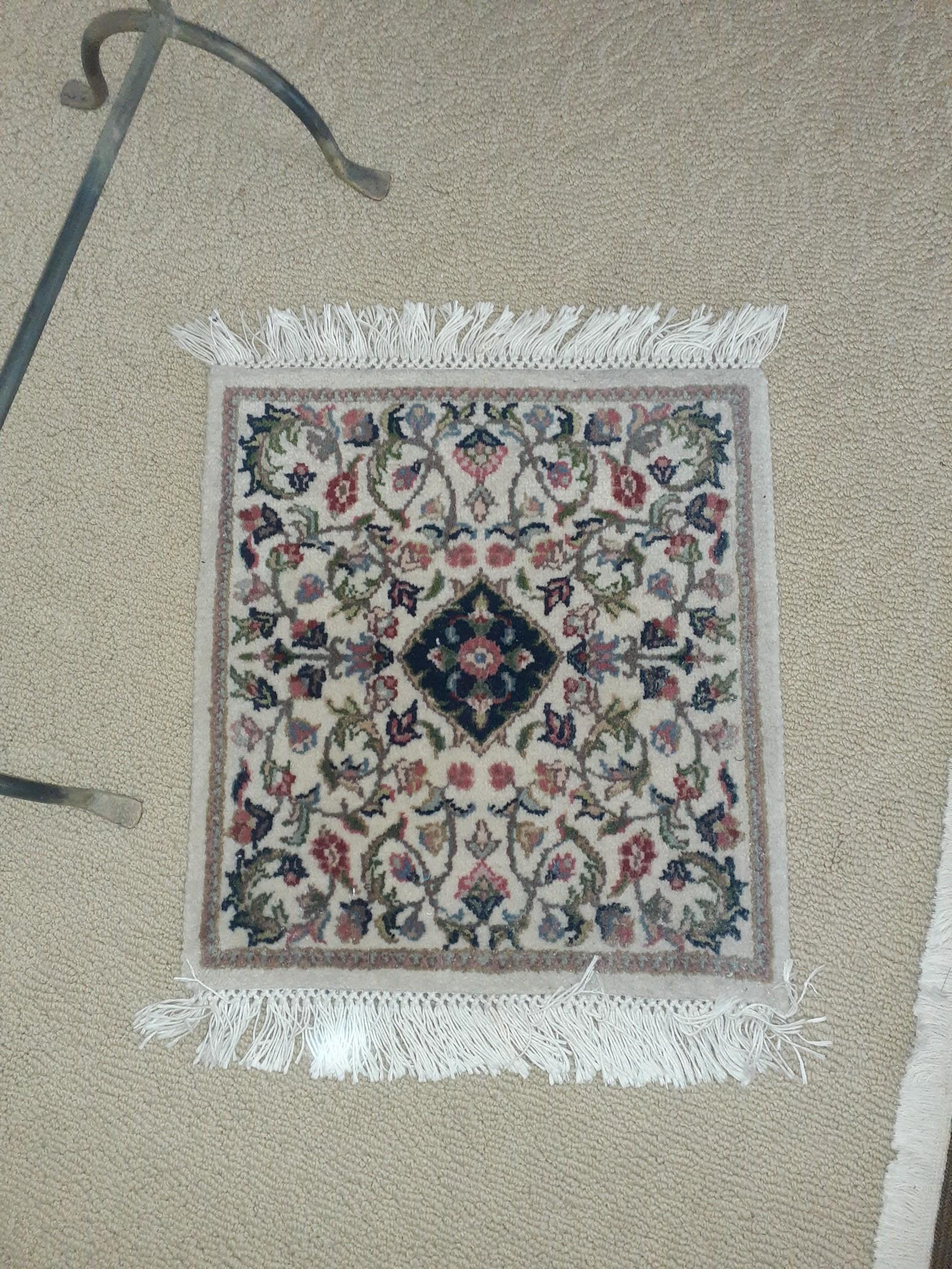 3 small rugs