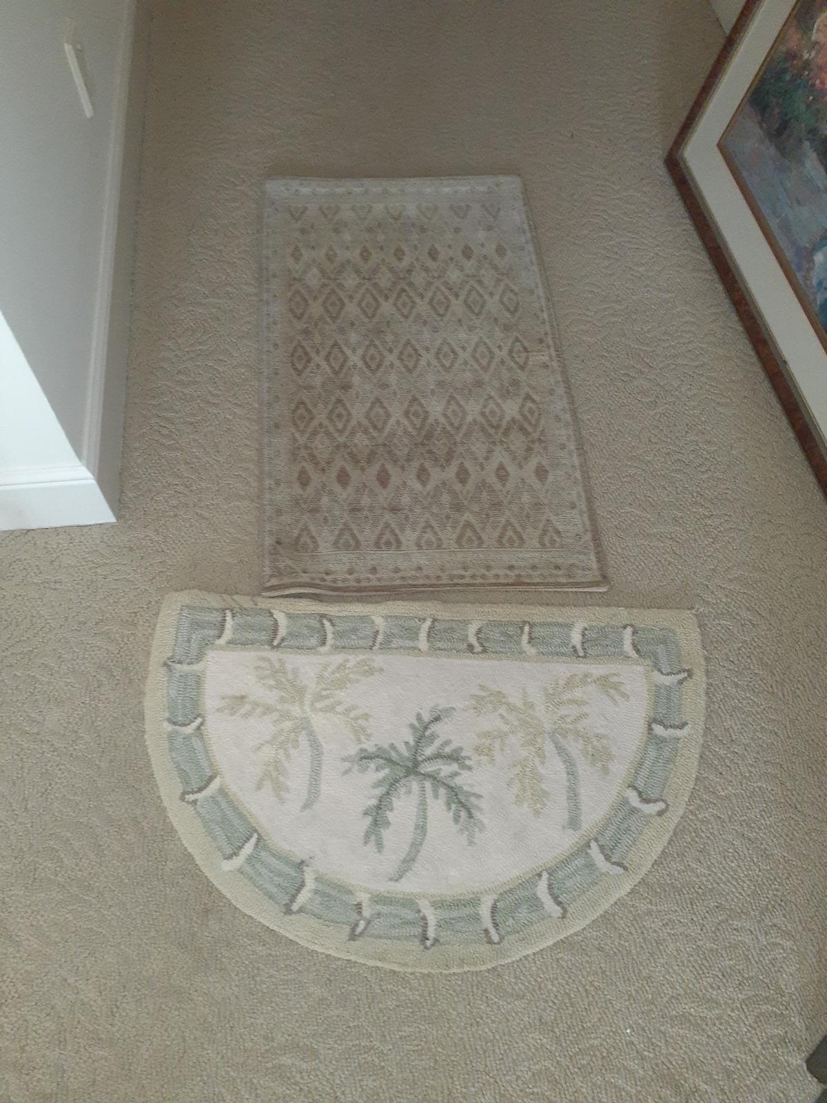 3 small rugs