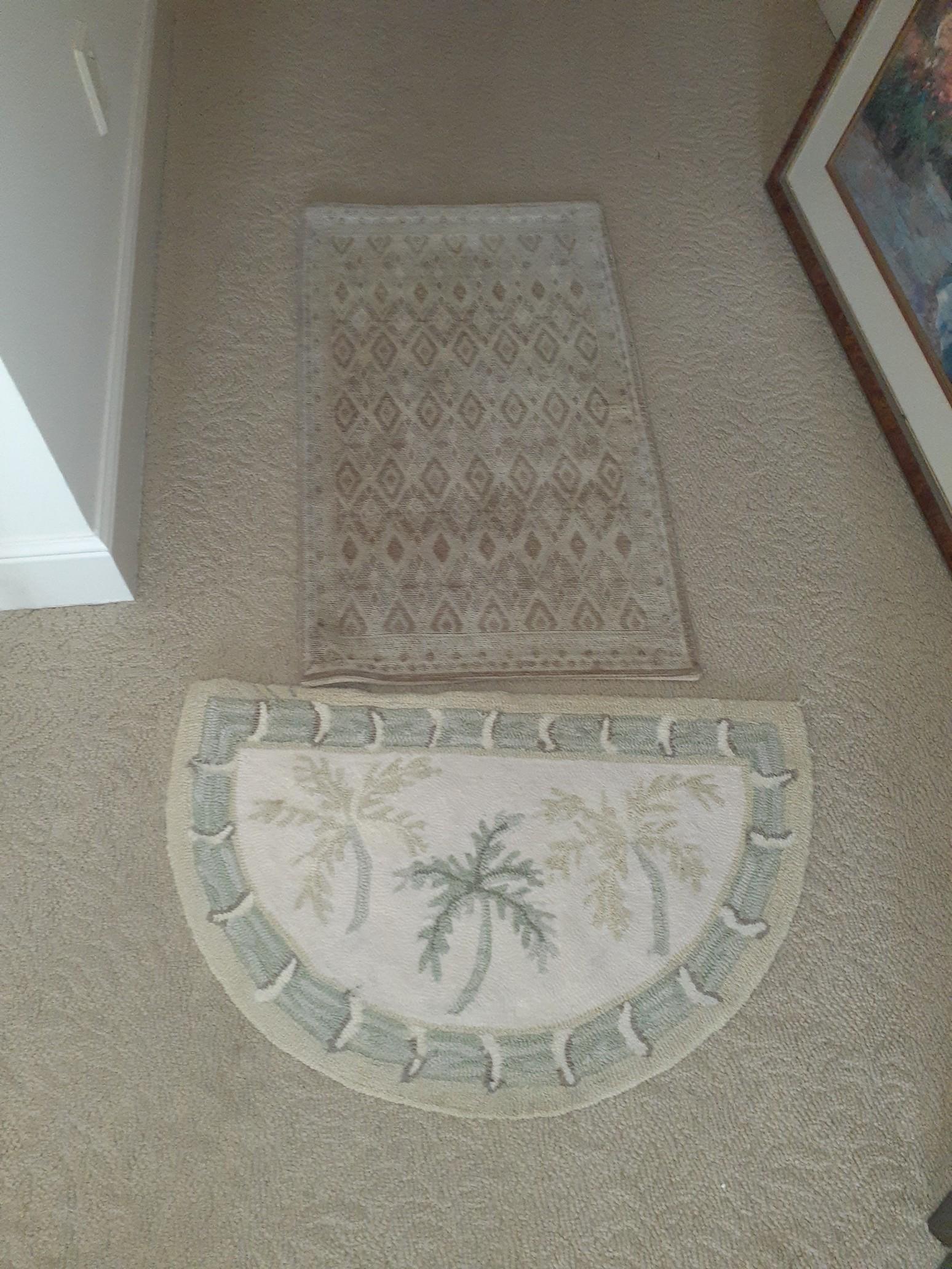 3 small rugs