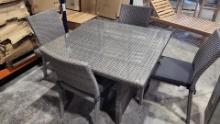 OPEN BOX - BRAND NEW OUTDOOR SYNTHETIC WICKER SQUARE TABLE WITH 4 STACKING GREY CHAIRS AND CUSHIONS