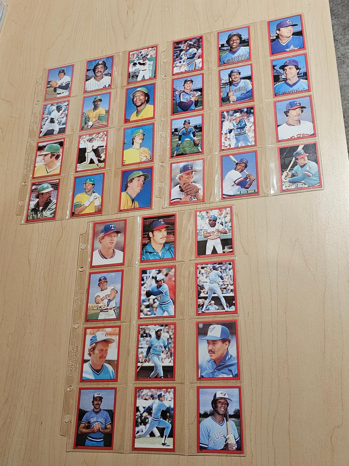 Assorted Baseball Trading Cards in Plastic Protective Sheets