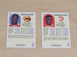 Akeem Olajuwon and Dominique Wilkins NBA Hoops Trading Cards