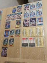 Assorted Baseball Trading Cards in Plastic Protective Sheets