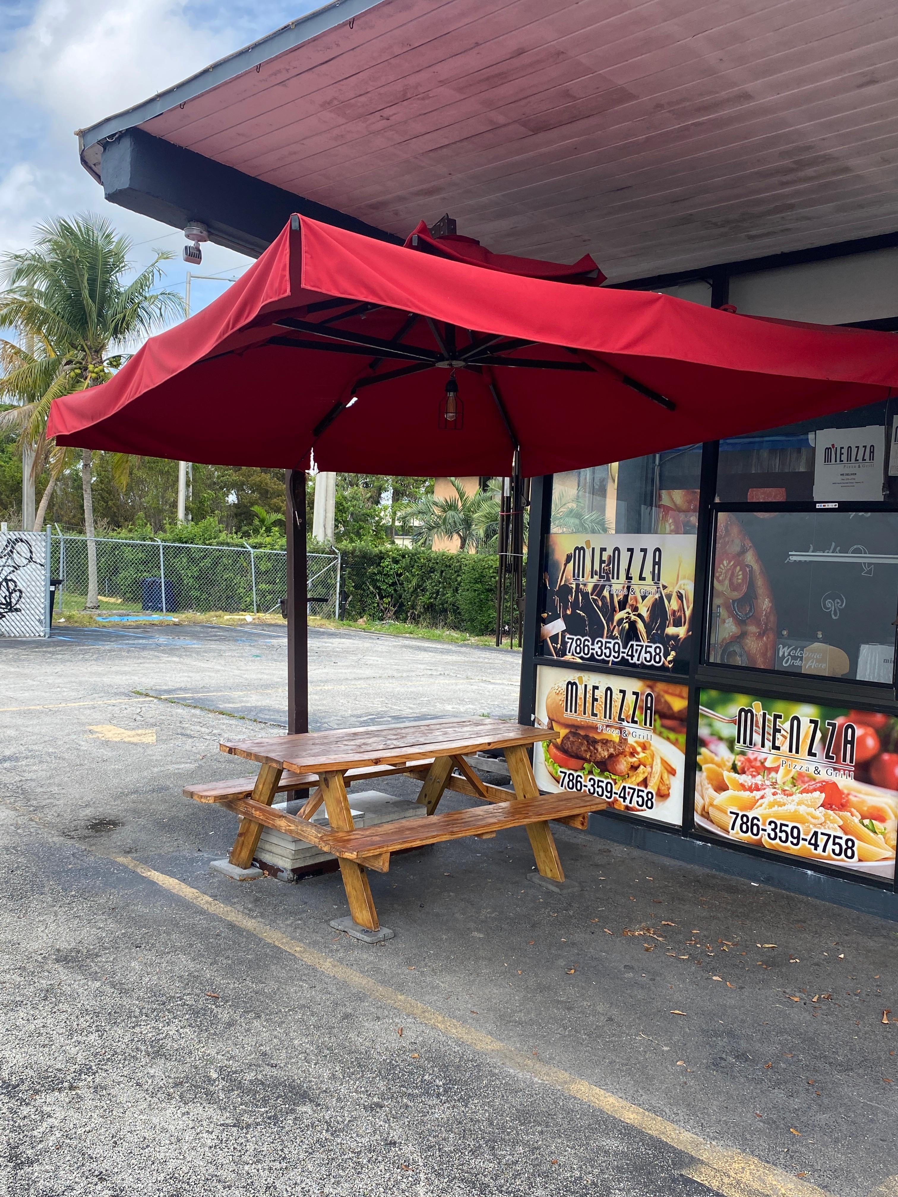 Large 110" Outdoor Canopy Umbrella it does have some tares.