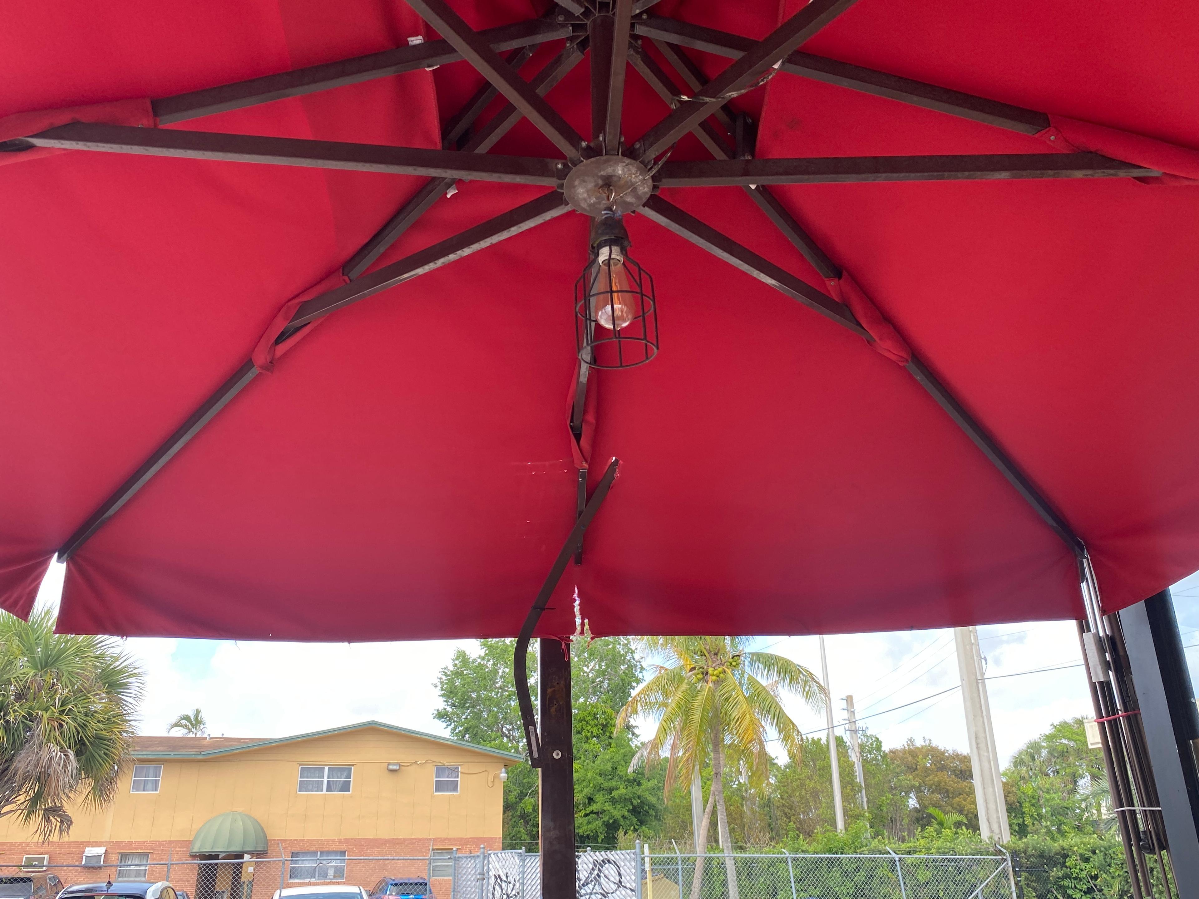 Large 110" Outdoor Canopy Umbrella it does have some tares.