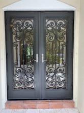 Front Doors, with Impact Glass By Jeld-Wen with Fancy Metal Design in Glass Panels  Handed to Buyer