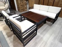 A 4 Piece Outdoor Patio Furniture Set with a 3 Seater Sofa, (2) Side Chairs and a Teak Top Coffeee T