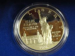 (2) 1986 U.S MINT LIBERTY COIN SETS: (1) UNCIRCULATED LIBERTY DOLLAR SILVER COIN; (1) TWO-COIN PROOF