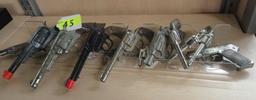 12 VINTAGE TOY CAP PISTOLS