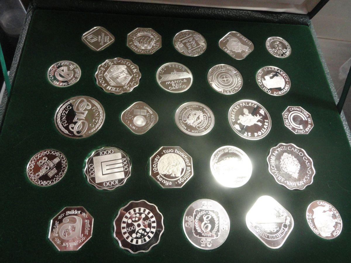 THE OFFICIAL GAMING COINS OF THE WORLD'S GREAT CASINOS.