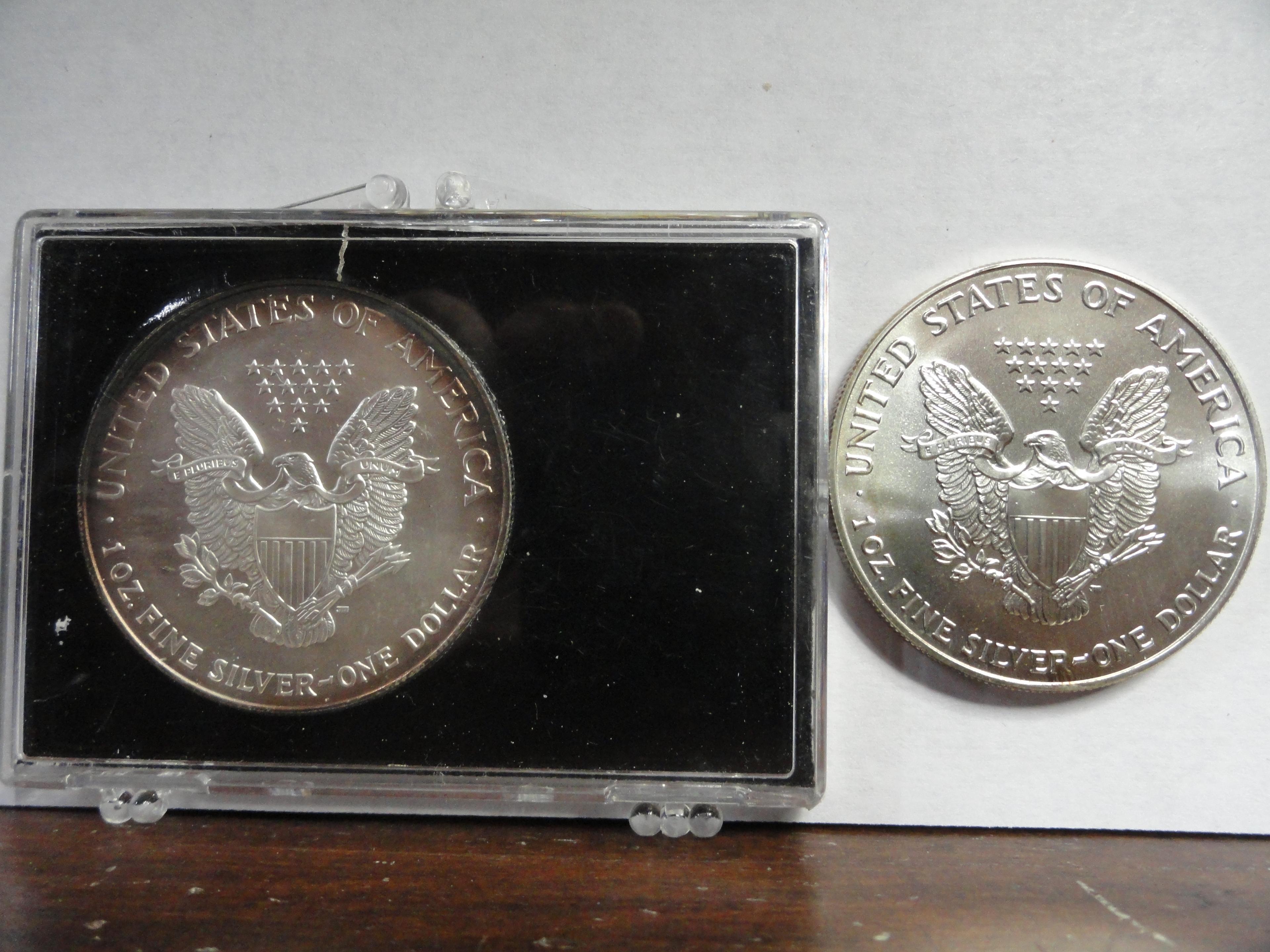 (2) BU AMERICAN EAGLE ONE OUNCE SILVER COINS: 1993, 1995