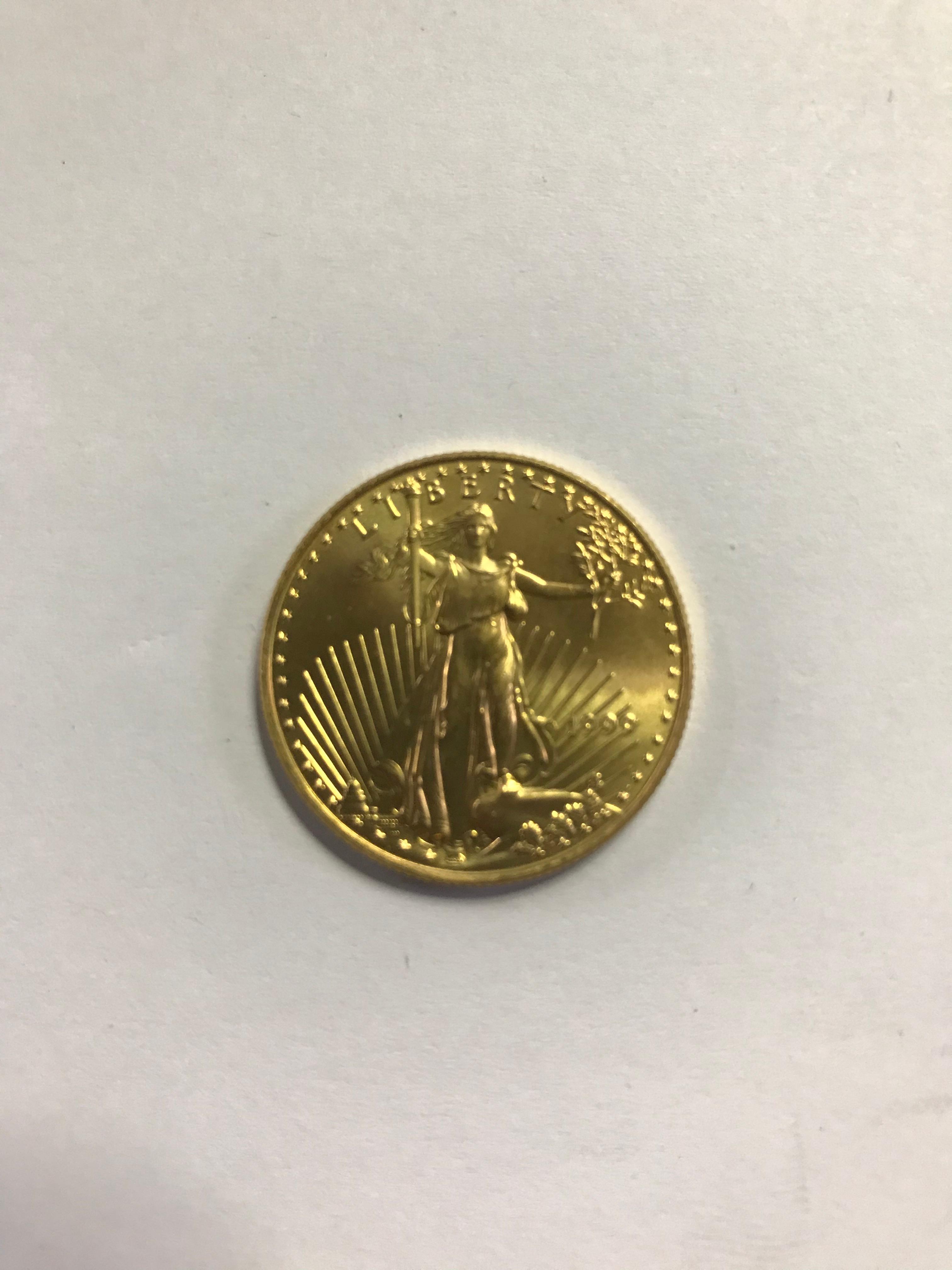 1999 25 DOLLAR, 1/2 OUNCE FINE GOLD COIN