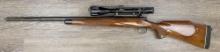 REMINGTON MODEL 700 7MM-08 CALIBER BOLT-ACTION RIFLE W/BUSHNELL 4X-12X BANNER SCOPE (CIRCA 1975).