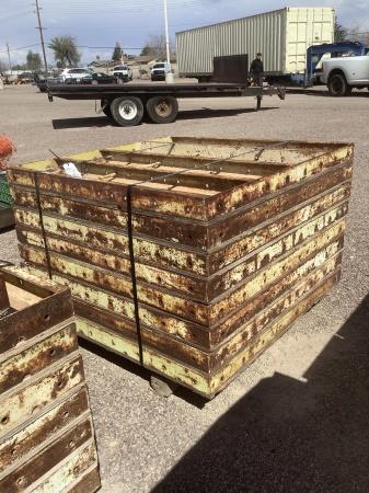 STACK OF 4FT X 4FT CONCRETE FORMS