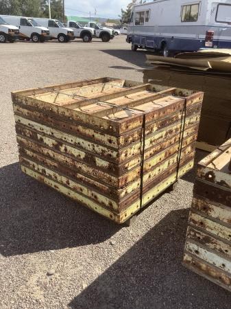 STACK OF 4FT X 4FT CONCRETE FORMS