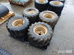 Four Used Trencher Tires & Wheels