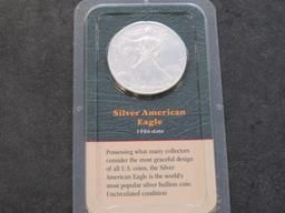 (3) UNCIRCULATED SILVER AMERICAN EAGLE COINS & (1) 1851 FAKE USA SILVER DOLLAR