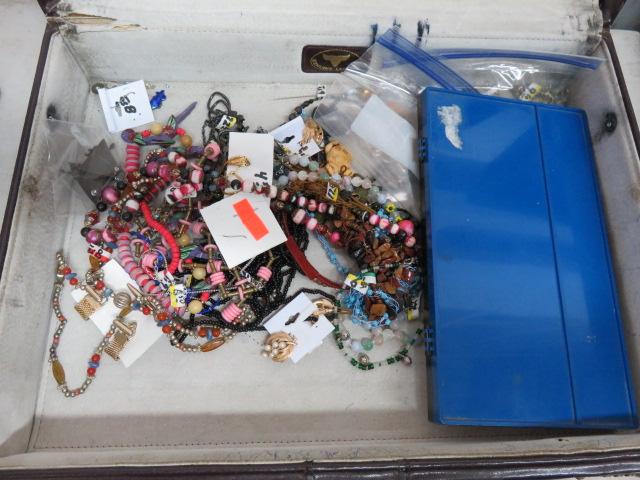 BRIEF CASE CONTAINS MOSTLY COSTUME JEWELRY