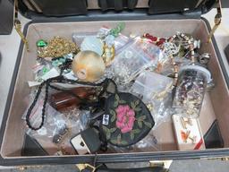 BRIEF CASE CONTAINS MOSTLY COSTUME JEWELRY