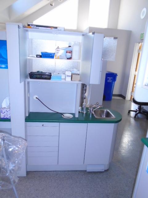 CABINET W/SINK & ASSORTED DENTAL SUPPLIES