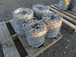 PALLET W/(4) ROLLS OF BARBED WIRE