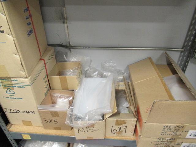 SECTION OF METAL RACKING W/ASSORTED SIZE POLY BAGS