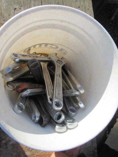 BUCKET OF ADJUSTABLE WRENCHES