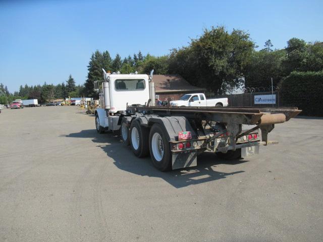 1994 PETERBILT 257 ROLL OFF TRUCK