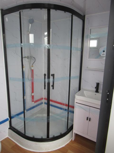 2024 SIMPLE SPACE PORTABLE BATHROOM W/ SHOWER, SINK & CABINET (UNUSED)